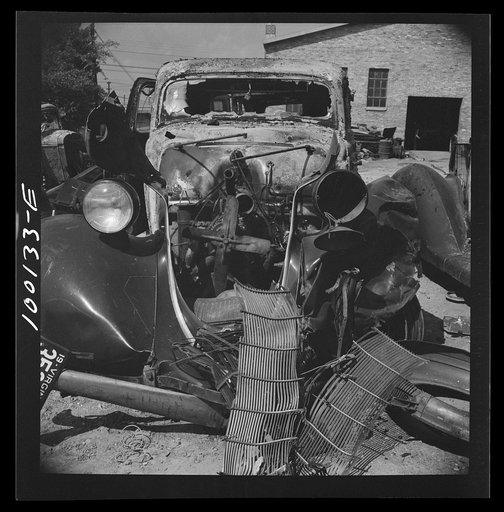 Washington, D.C. Scrap salvage campaign, Victory Program. Car dismantled of saleable parts before burning it in a wholesale junkyard