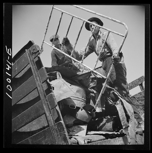Washington, D.C. Scrap salvage campaign, Victory Program. Unloading scrap at a wholesale junkyard