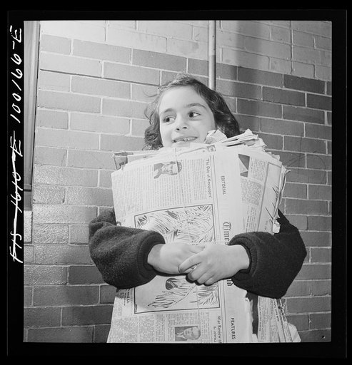 Washington, D.C. Scrap salvage campaign, Victory Program. Washington schoolchild brings a load of scrap paper to school once a week. Here it is collected by paper company truck
