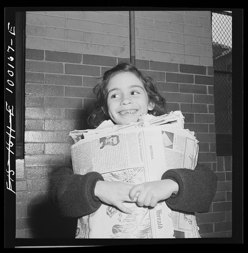 Washington, D.C. Scrap salvage campaign, Victory Program. Washington schoolchild brings a load of scrap paper to school once a week. Here it is collected by paper company truck