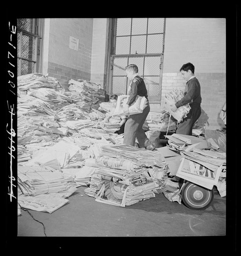 Washington, D.C. Scrap salvage campaign, Victory Program. Schoolchildren bring their scrap paper from their classrooms into the cellar, where it is picked up by paper company truck