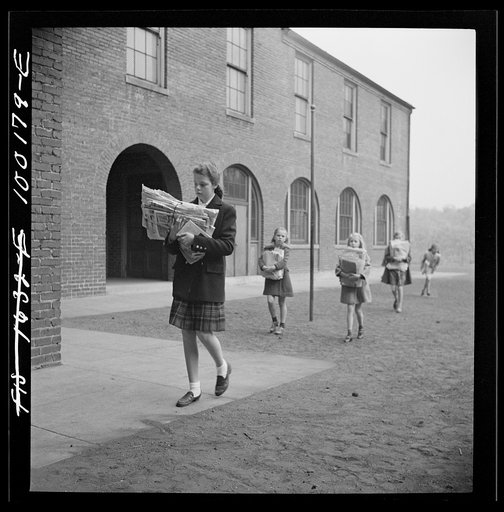 Untitled photo, possibly related to: Washington, D.C. Scrap salvage campaign, Victory Program. Children bringing their weekly contribution of scrap paper to school