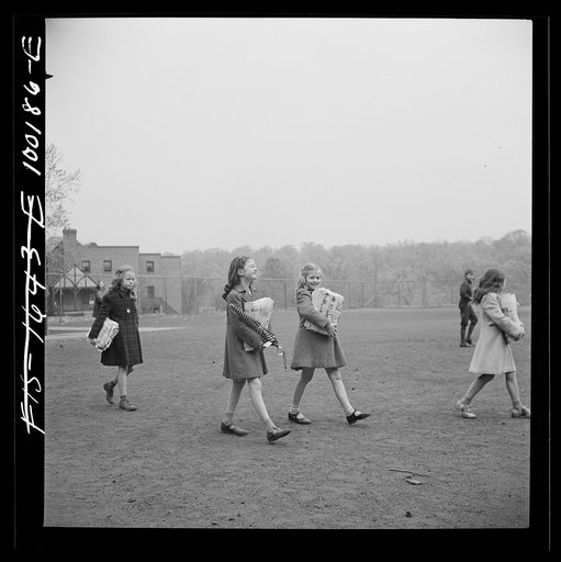 Washington, D.C. Scrap salvage campaign, Victory Program. Children bringing their weekly contribution of scrap paper to school