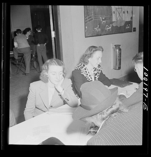 Residents of one of Washington's best residential sections apply for sugar ration cards at Adams School