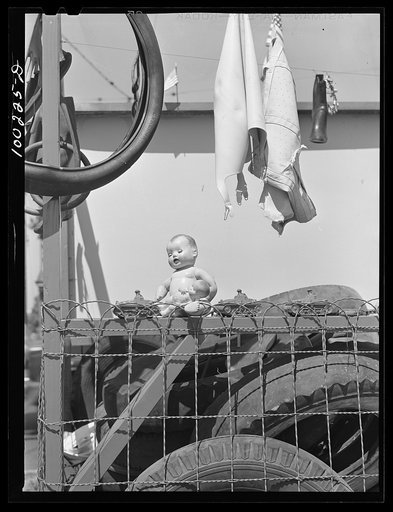 Washington, D.C. Girdles, toys, tires in rubber salvage pile at Georgia Avenue filling station