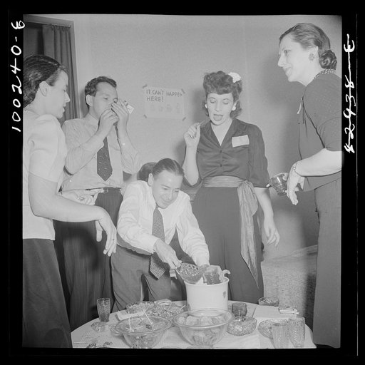 Washington, D.C. Serving punch during an evening party at the home of a government artist