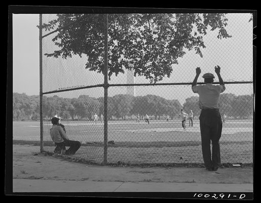 Untitled photo, possibly related to: Washington, D.C. Amateur baseball games are held daily on fields near the Washington Monument, between rival governmental departments, employees of restaurants, garages, etc.
