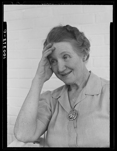 Chevy Chase, Maryland. Mrs. Harper, who runs a tourist home at 5530 Wisconsin Avenue. She charges two dollars to two dollars and fifty cents a night and most guests stay until they find an apartment, because it is cheaper than hotels in town