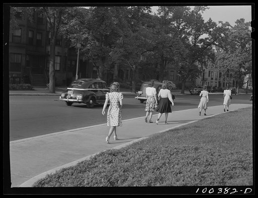 Washington, D.C. Girls going to work through Scott Circle early in the morning