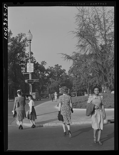 Washington, D.C. Girls going to work through Scott Circle early in the morning