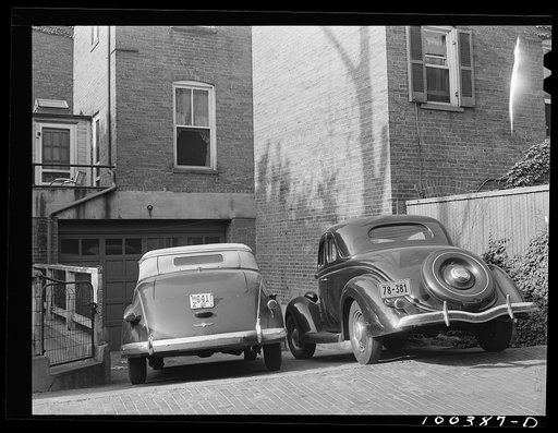 Washington, D.C. Cars parked in an alley behind the boardinghouses on N Street
