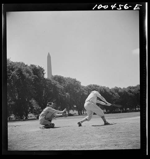 Untitled photo, possibly related to: Washington, D.C. One of the amateur baseball games between teams representing restaurants, garages, government workers, etc. which go on every afternoon in summer, and especially on Sunday, on diamonds in the Ellipse