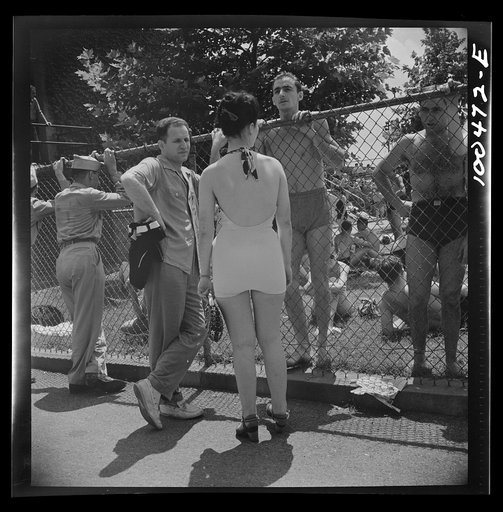 Washington, D.C. Sunday crowds are so great at the municipal swimming pool that long lines form awaiting their turn