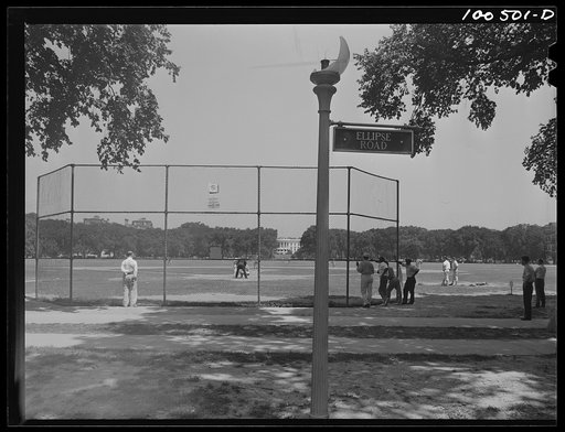 Untitled photo, possibly related to: Washington, D.C. Amateur baseball game between two rival restaurants held on Sunday in the Ellipse. The White House is in the background