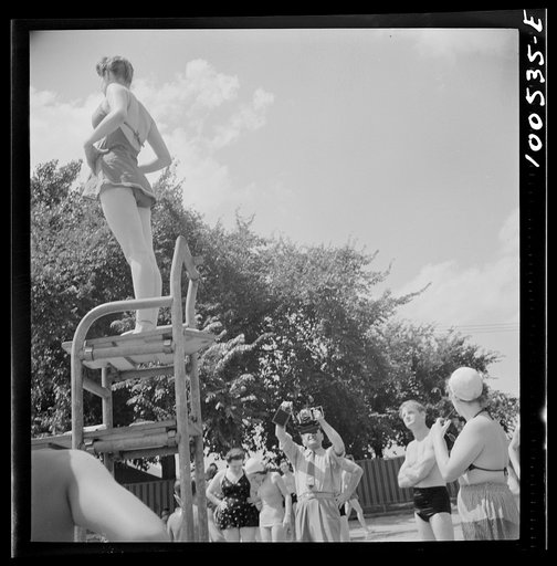 Washington, D.C. Publicity photographer and model at the municipal swimming pool on Sunday