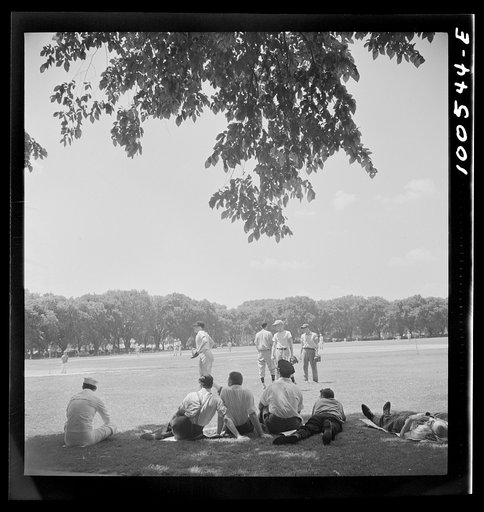 Untitled photo, possibly related to: Washington, D.C. Sunday baseball game at Ellipse Park between garage workers and the employees' recreation association