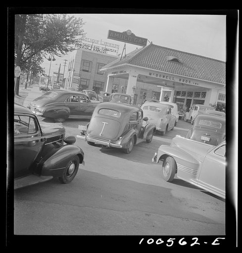 Untitled photo, possibly related to: Washington, D.C. At 7 a.m. on June 21st, the day before stricter gas rationing was enforced, cars were pouring into this gas station on upper Wisconsin