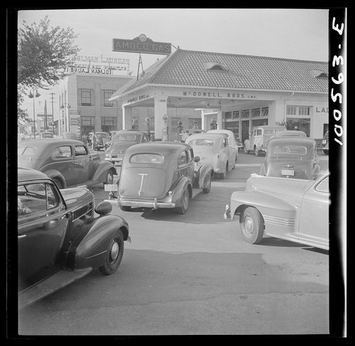 Washington, D.C. At 7 a.m. on June 21st, the day before stricter gas rationing was enforced, cars were pouring into this gas station on upper Wisconsin