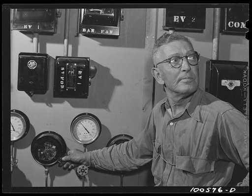 Washington, D.C. Engineer Graham is a full-time employee at the District grocery store, on call at all hours of the day and night. He is responsible for air conditioning and keeping the storerooms and cold room at the right temperature