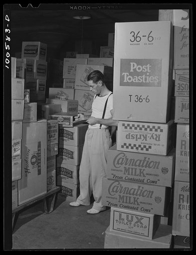Washington, D.C. Checking merchandise in the grocery department of the District grocery store warehouse