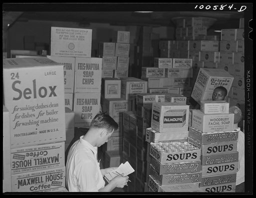 Washington, D.C. Checking merchandise in the grocery department of the District grocery store warehouse