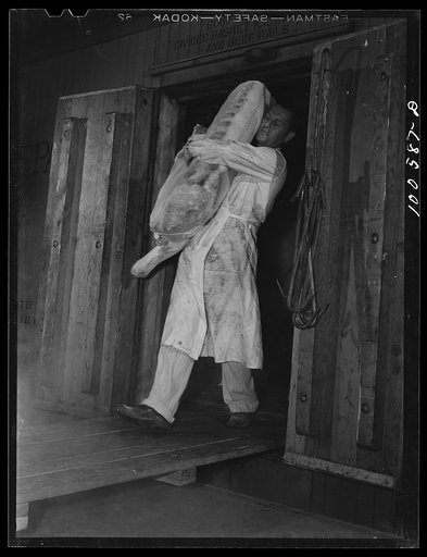 Washington, D.C. Unloading a meat train at the District grocery store warehouse