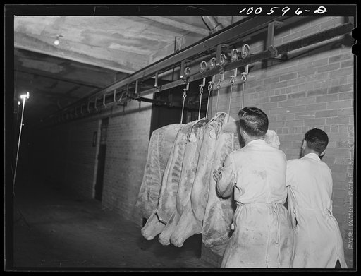 Untitled photo, possibly related to: Washington, D.C. Unloading a meat train at the District grocery store warehouse