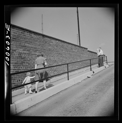 Washington, D.C. Customers mounting the ramp to a roof parking space at the Giant Food shopping center on Wisconsin Avenue