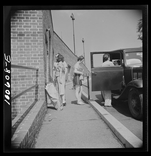 Washington, D.C. Loading groceries into a car at the Giant Food shopping center on Wisconsin Avenue