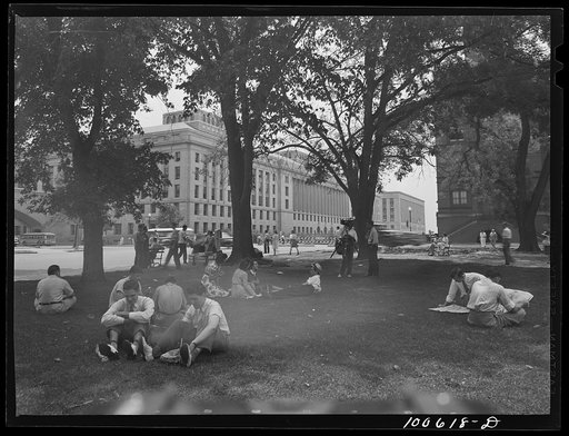 Untitled photo, possibly related to: Washington, D.C. Government workers lunch outside the U.S. Department of Agriculture in Washington Monument park