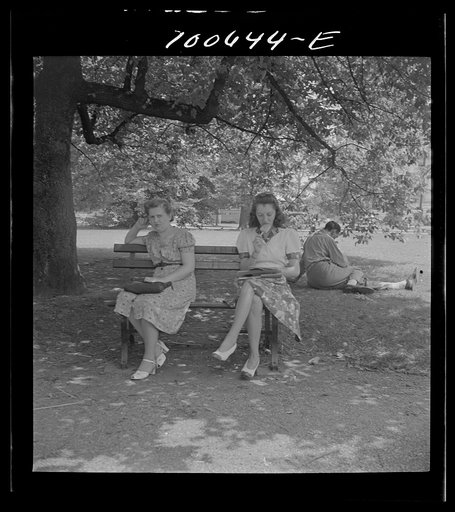 Washington, D.C. Government workers lunching and resting in Washington Monument park outside the U.S. Department of Agriculture