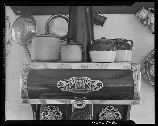 Birmingham, Michigan (vicinity). Old style jewel stove and earthenware pots in a country home