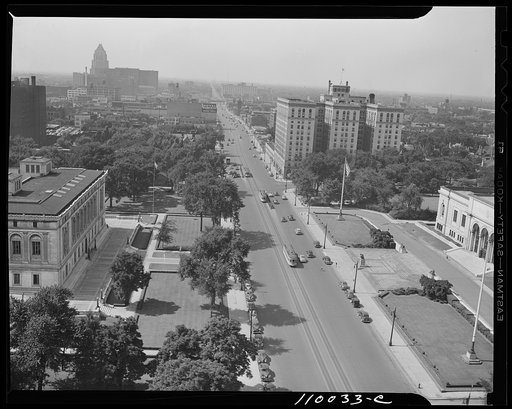 Detroit, Michigan. Looking north on Woodward Avenue from the Maccabee Building, with the Fisher Building at the far left and the Wardell hotel at the middle right