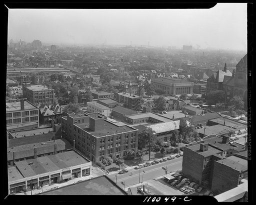 Detroit, Michigan. Looking southwest from the Maccabee Building at a typical transition area with the Ambassador Bridge in the background