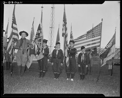 Detroit, Michigan. Cub Scouts with flag standards at the British Blitz Scout meeting