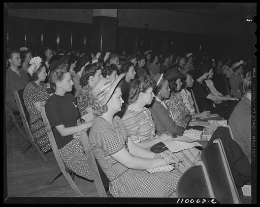 White and Negro youths at the salvage committee meeting