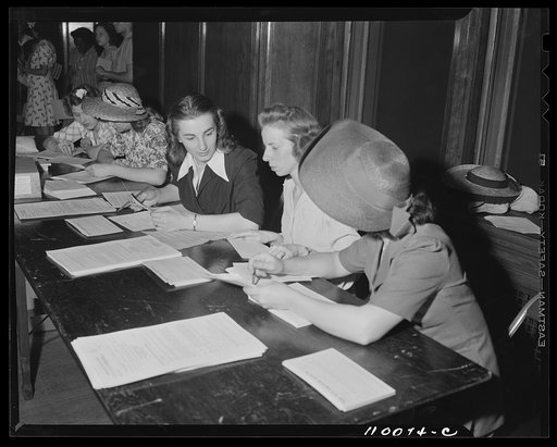 Detroit, Michigan. Girl registrars at the youth salvage committee meeting