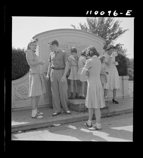 Untitled photo, possibly related to: Detroit, Michigan. Little girls at a drinking fountain in the zoological park