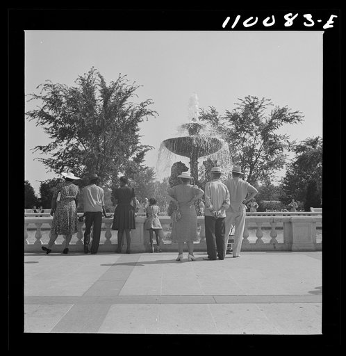 Detroit, Michigan. Spectators watching a fountain