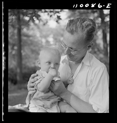 Untitled photo, possibly related to: Detroit, Michigan. Father and son