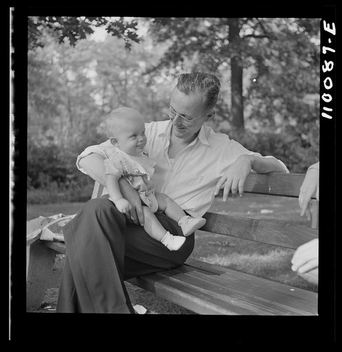Untitled photo, possibly related to: Detroit, Michigan. War worker and child
