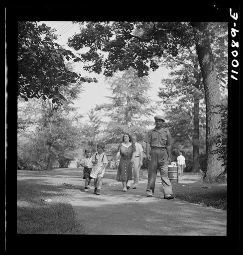 Detroit, Michigan. War worker and family strolling through the zoological park
