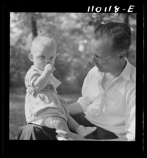 Untitled photo, possibly related to: Detroit, Michigan. Father and son