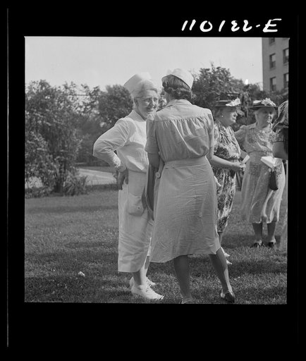 Untitled photo, possibly related to: Detroit, Michigan. Flag presentation ceremonies at Harper Hospital. Spectators at flag presentation ceremonies