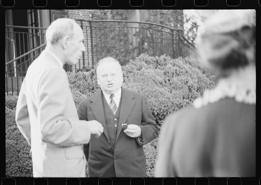 Washington, D.C. Lord Halifax, British ambassador, chatting with Maxim Litvinoff, Russian ambassador, at a garden party at the New Zealand Legation