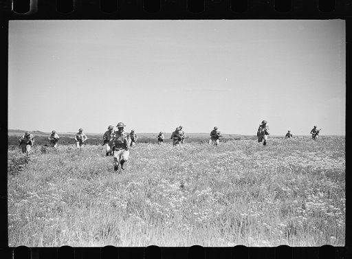 Fort Riley, Kansas. Dismounted attack of a reconnaissance unit during a field problem