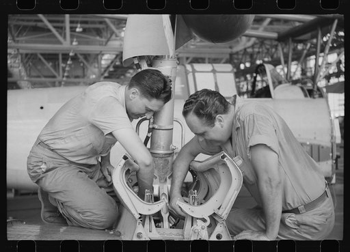 Nashville, Tennessee. Vultee Aircraft Company. Working on the landing gear of a bomber
