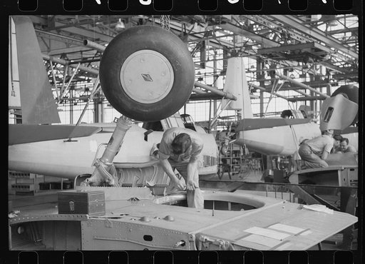 Nashville, Tennessee. Vultee Aircraft Company. Working on the landing gear of a bomber