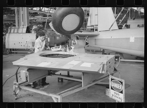 Nashville, Tennessee. Vultee Aircraft Company. Working on the landing gear of a bomber