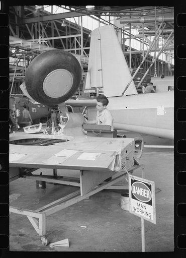 Nashville, Tennessee. Vultee Aircraft Company. Working on the landing gear of a bomber